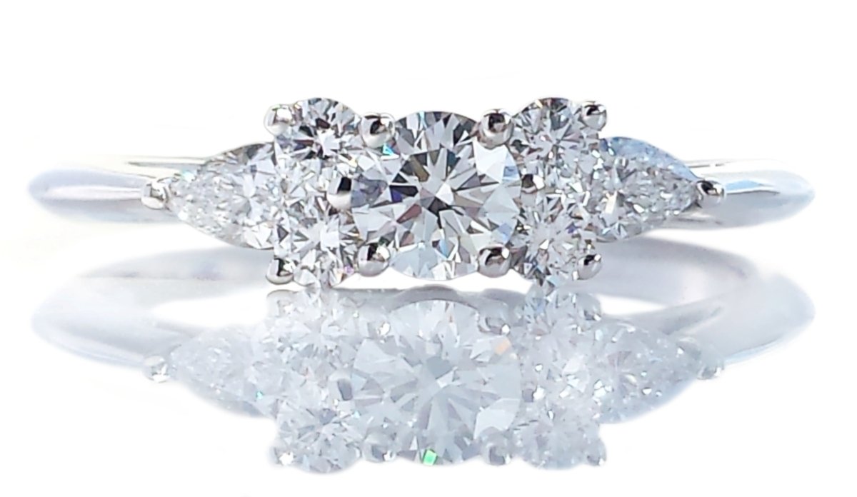 Tiffany & Co 0.63ct 7 Stone Round Brilliant and Pear Diamond Engagement Ring - Bloomsbury Manor Ltd