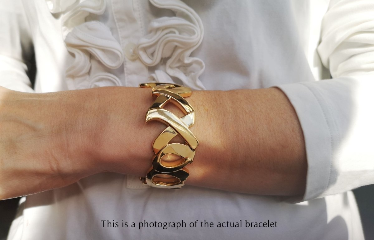 Tiffany & Co. 1980s Paloma Picasso XOXO Love & Kisses Bracelet on wrist - Bloomsbury Manor Ltd