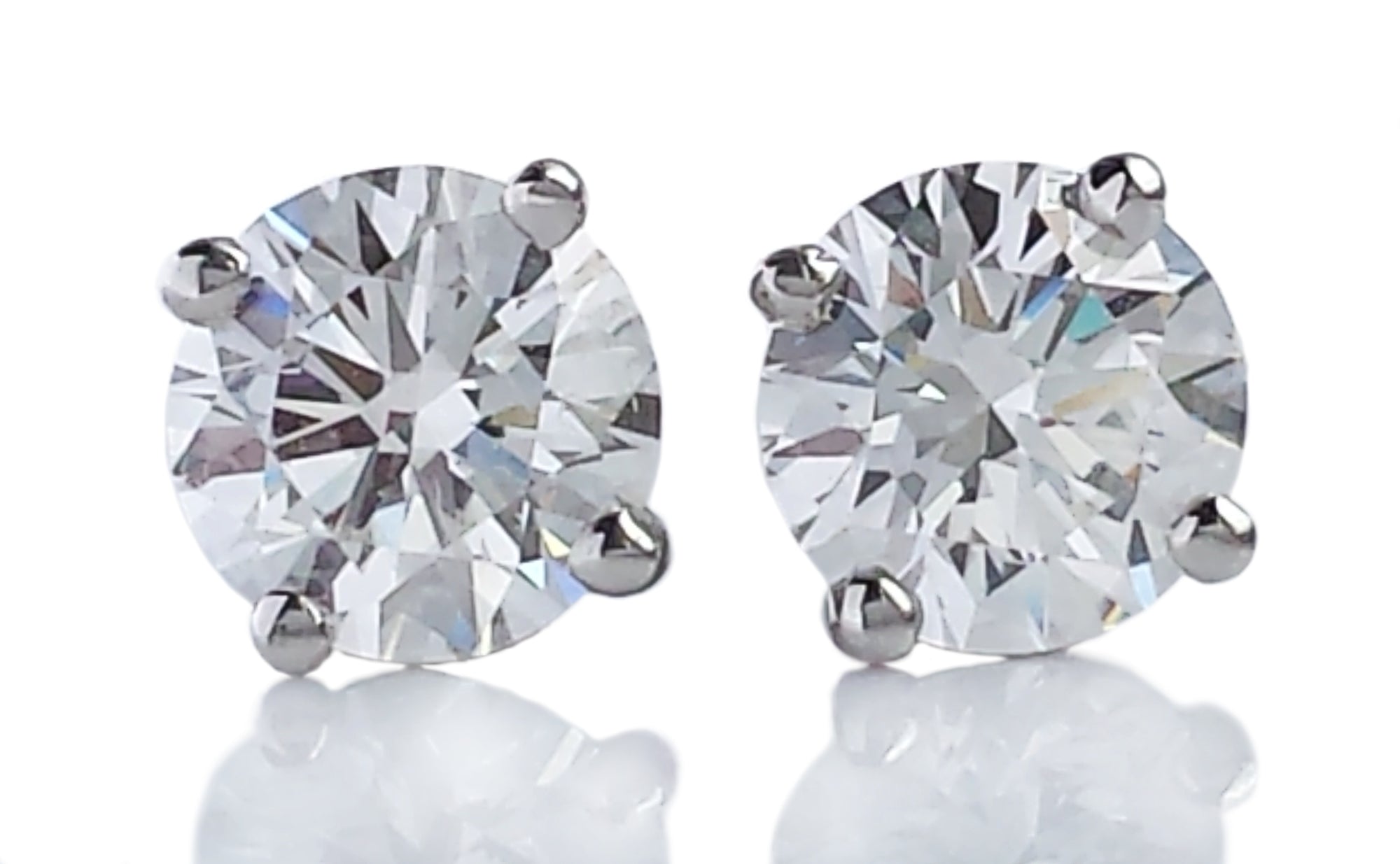 Tiffany & Co. 0.60tcw E-F/VS1 Round Brilliant Diamond Stud Earrings