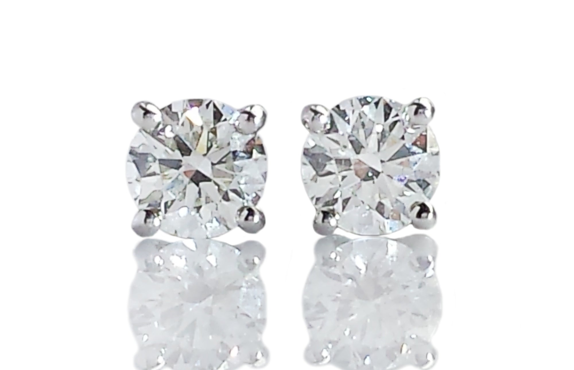 Tiffany & Co. 0.40tcw I-J/VS1 Round Brilliant Diamond Stud Earrings