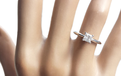 Tiffany & Co. 0.45ct E/VS1 Princess Cut Diamond Engagement Ring on model's finger