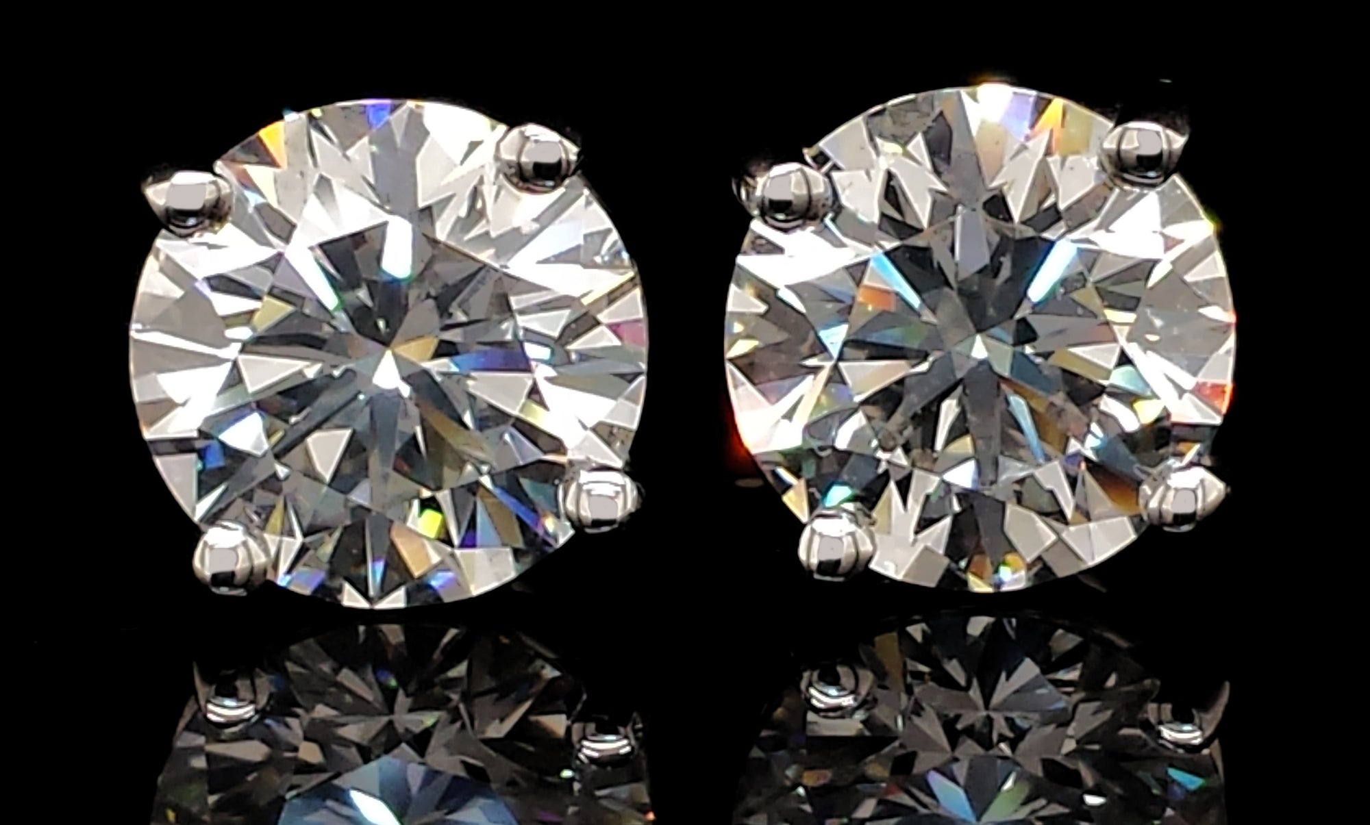 Tiffany & Co. 4.24tcw H/VS1 Round Brilliant Cut Diamond Stud Earrings