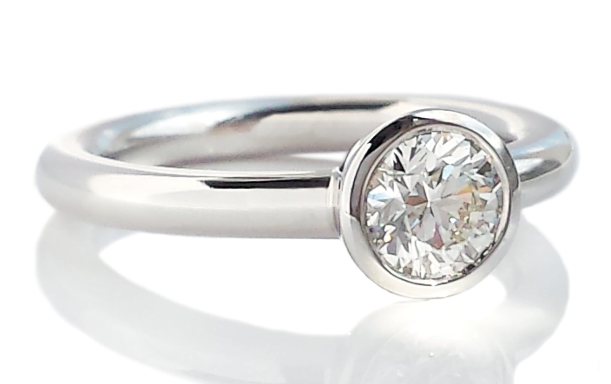 Tiffany & Co. 0.59ct H/VVS2 Bezet Set Round Brilliant Diamond Engagement Ring