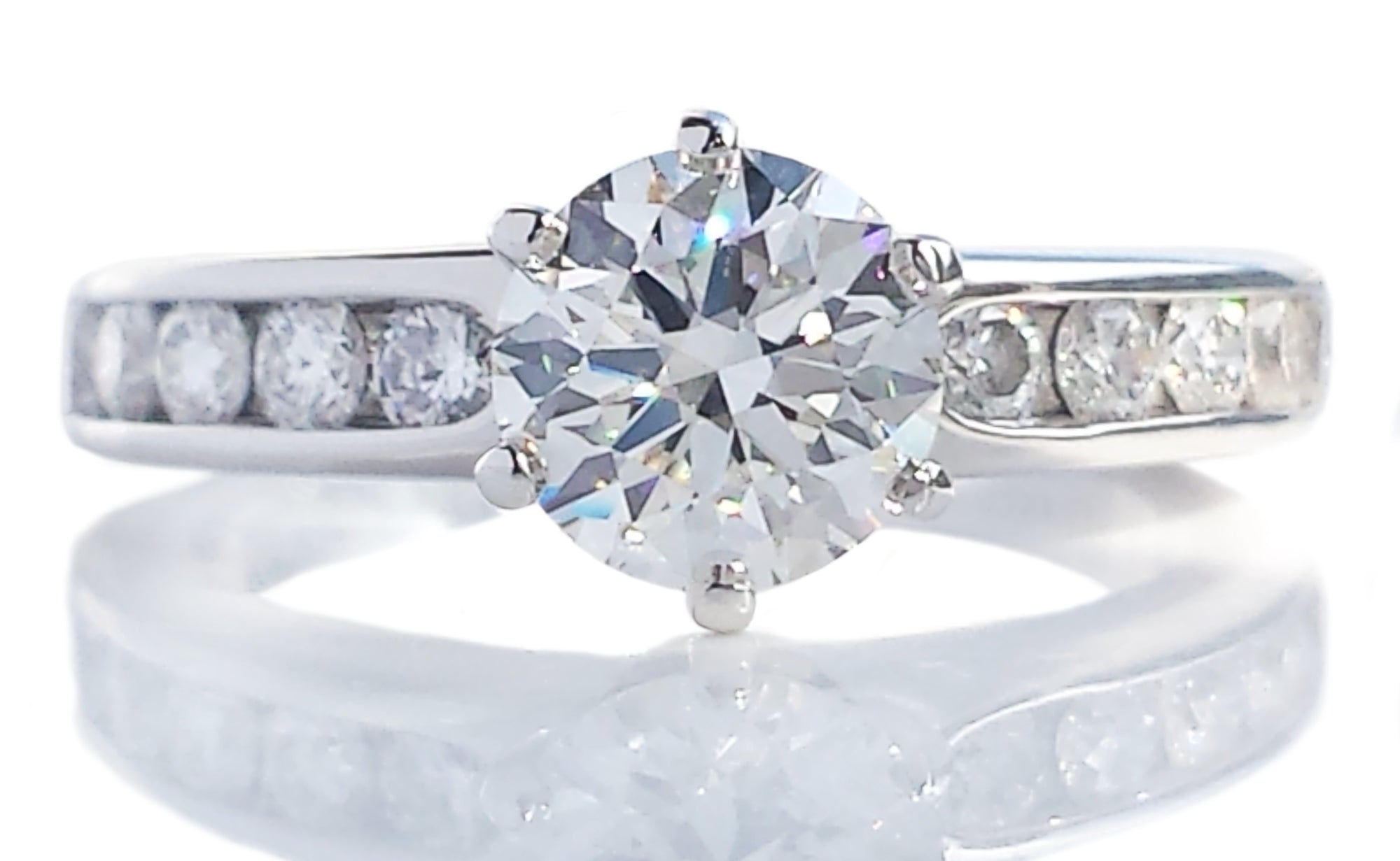 Tiffany & Co. 1.18tcw H/VS1 Round Brilliant Diamond Engagement Ring with Side Stones