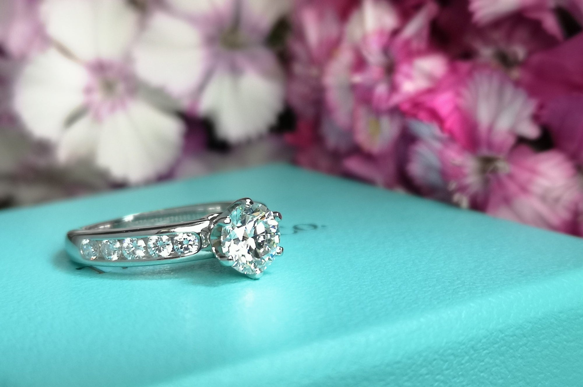 Tiffany & Co. 1.18tcw H/VS1 Round Brilliant Diamond Engagement Ring with Side Stones