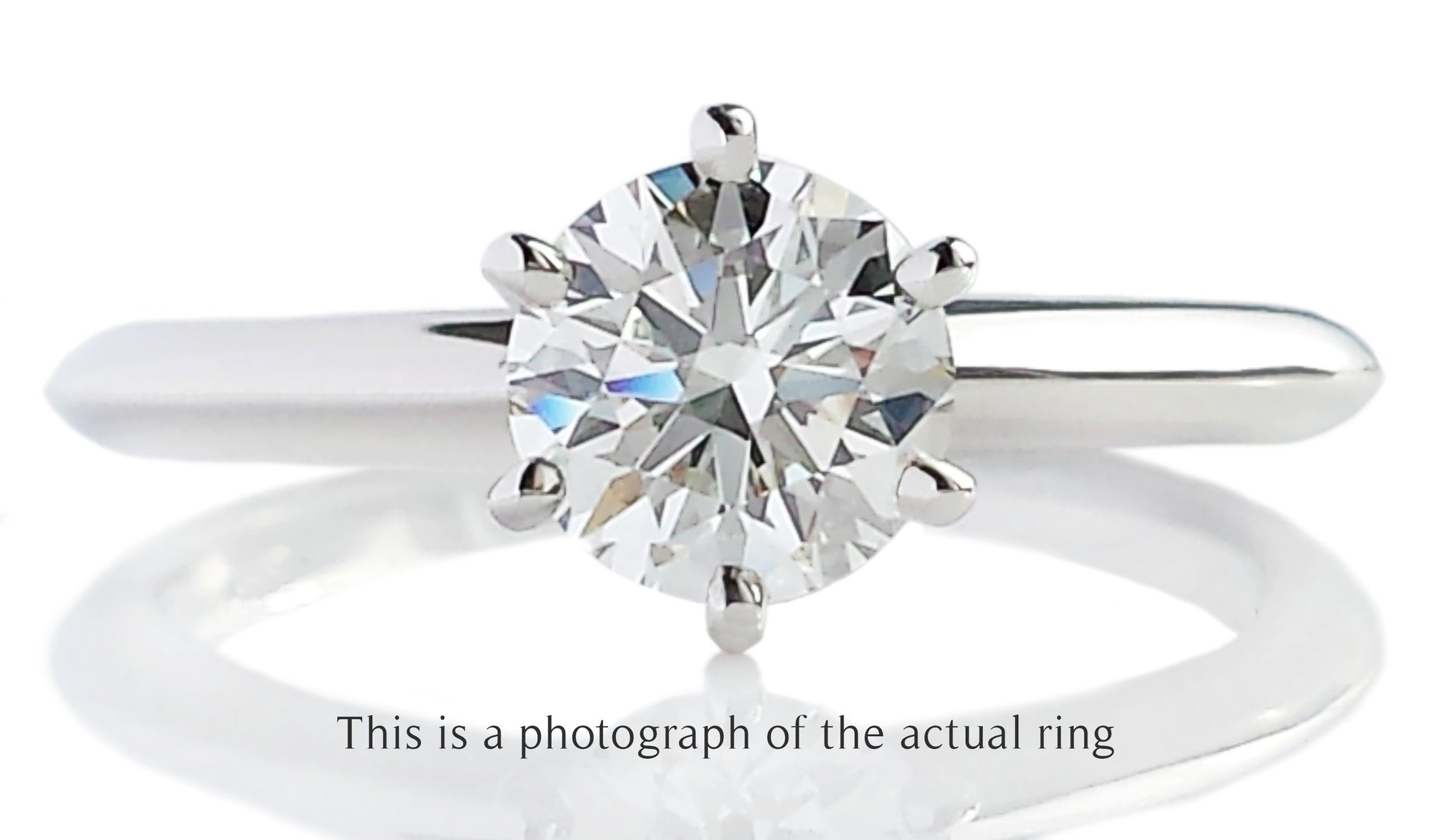 Tiffany & Co. 0.81ct I/VVS2 Triple XXX Round Brilliant Diamond Engagement Ring