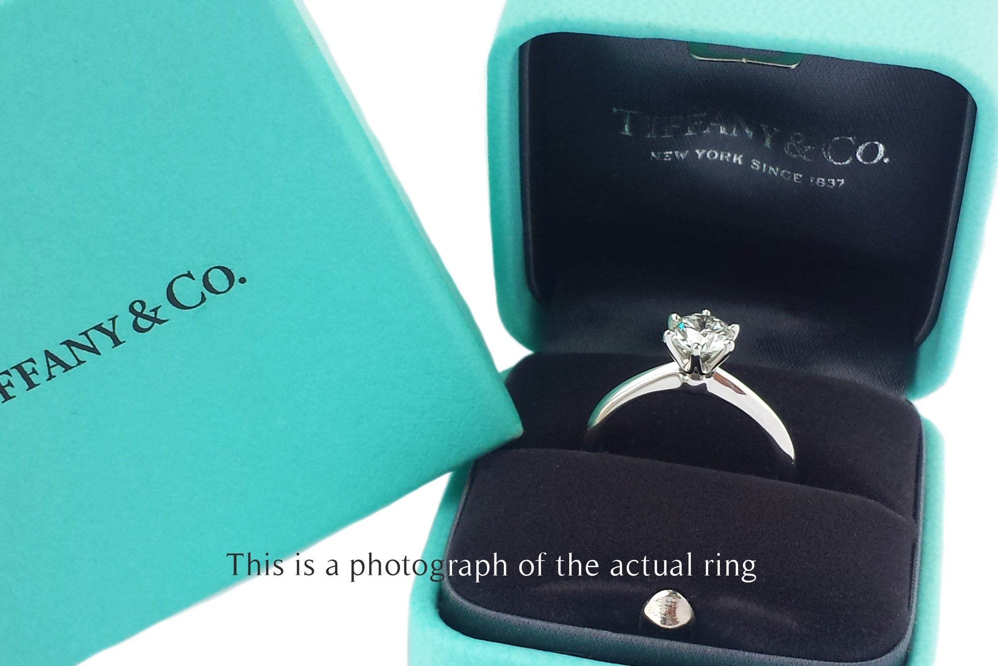 Tiffany & Co. 0.81ct I/VVS2 Triple XXX Round Brilliant Diamond Engagement Ring