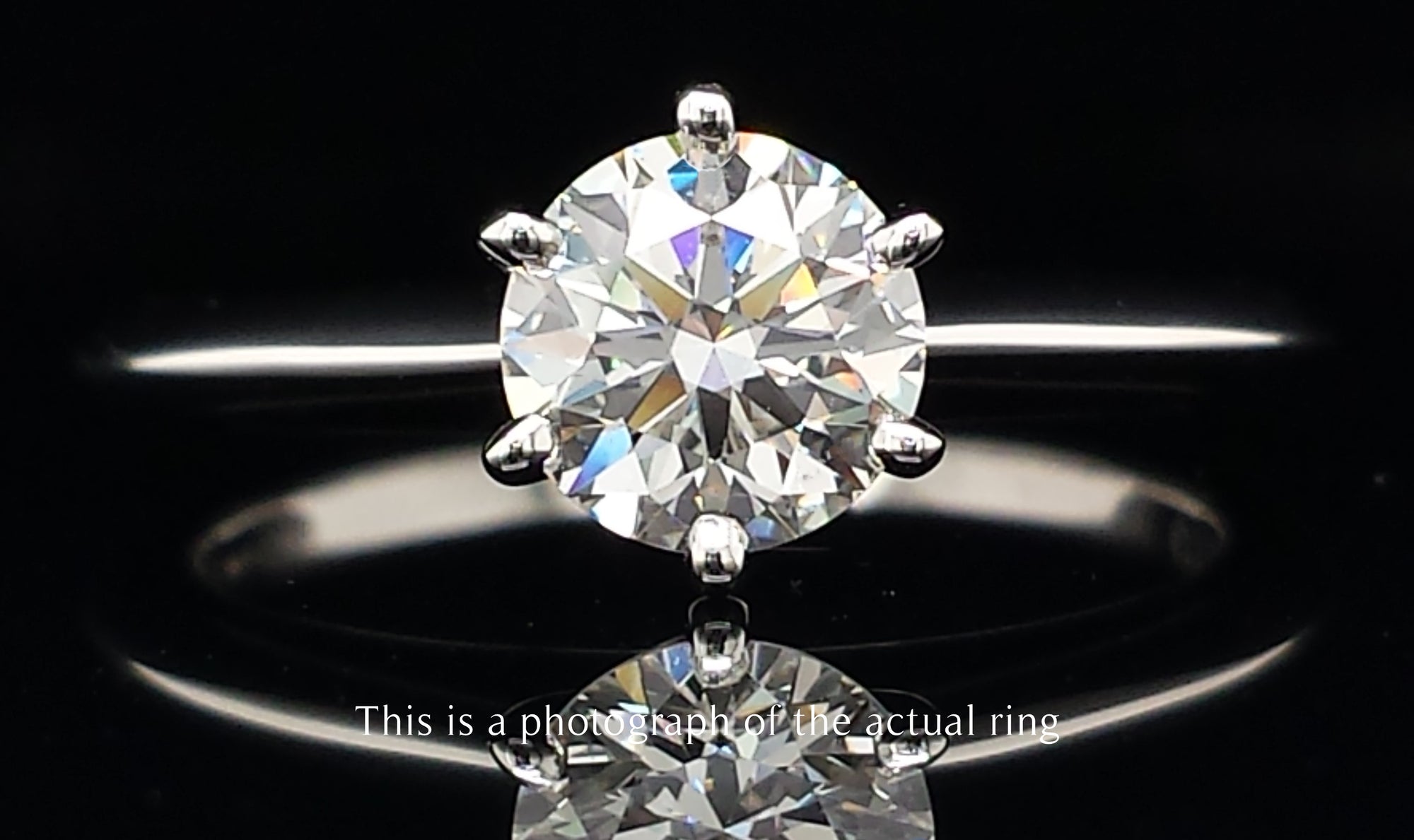 Tiffany & Co. 0.81ct I/VVS2 Triple XXX Round Brilliant Diamond Engagement Ring