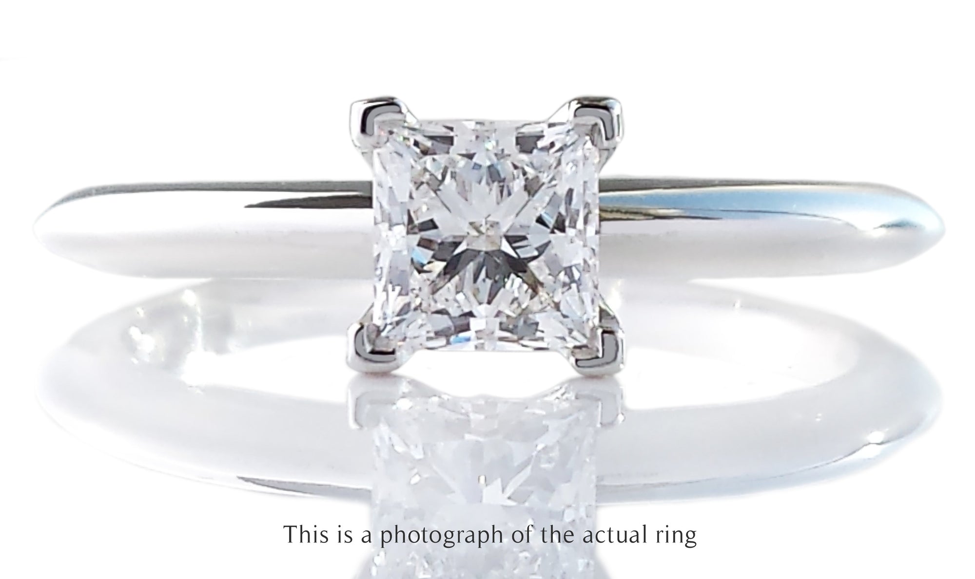 Tiffany & Co. 0.56ct E/IF Princess Cut Diamond Engagement Ring