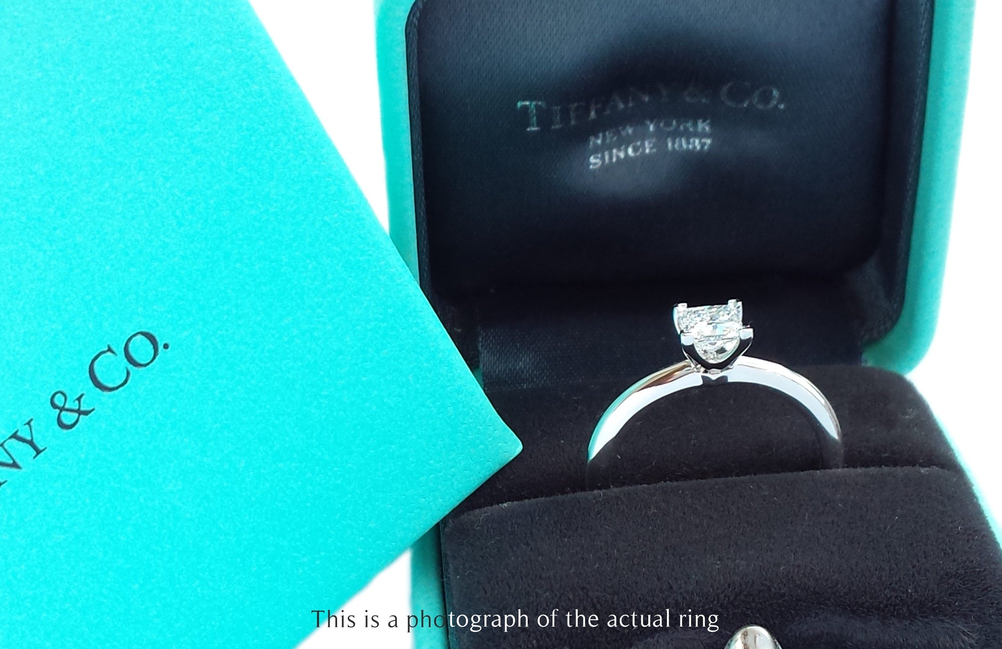 Tiffany & Co. 0.56ct E/IF Princess Cut Diamond Engagement Ring