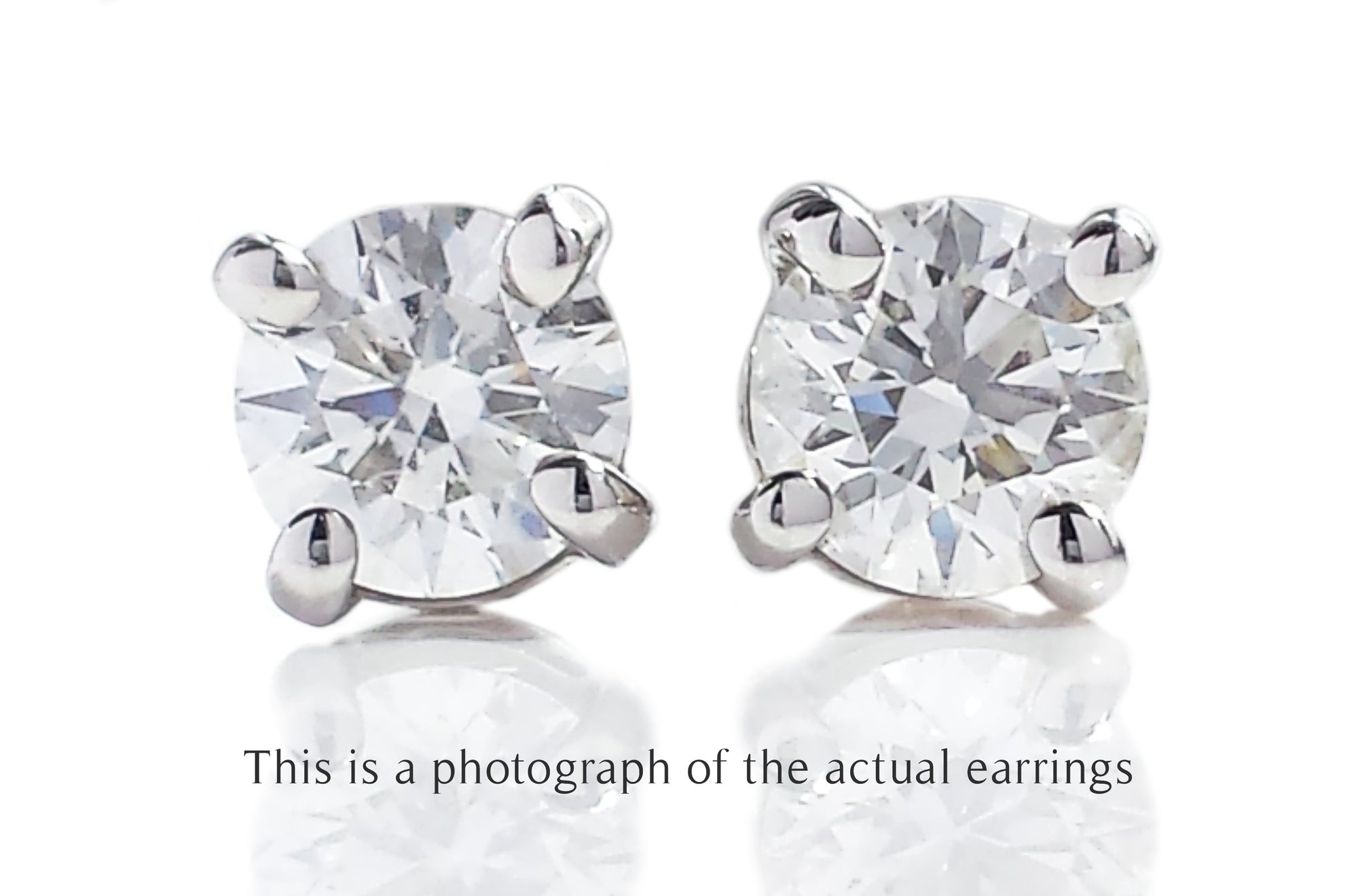 Tiffany & Co 0.46tcw H/VS1 Round Brilliant Cut Diamond Stud Earrings