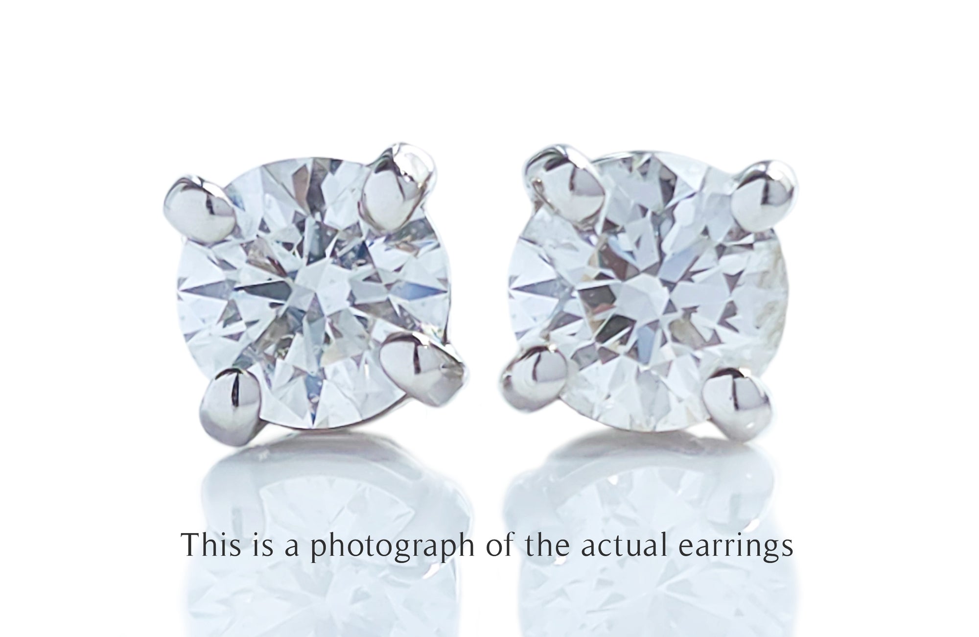 Tiffany & Co 0.46tcw H/VS1 Round Brilliant Cut Diamond Stud Earrings