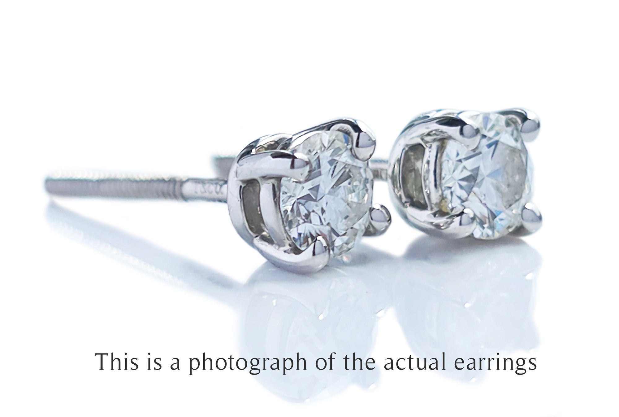Tiffany & Co 0.46tcw H/VS1 Round Brilliant Cut Diamond Stud Earrings