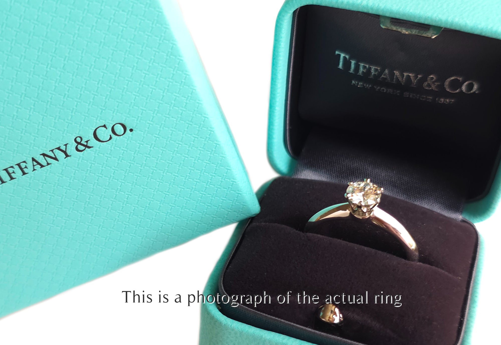 Tiffany & Co 0.69ct F/VS2 Round Brilliant Cut Diamond Engagement Ring