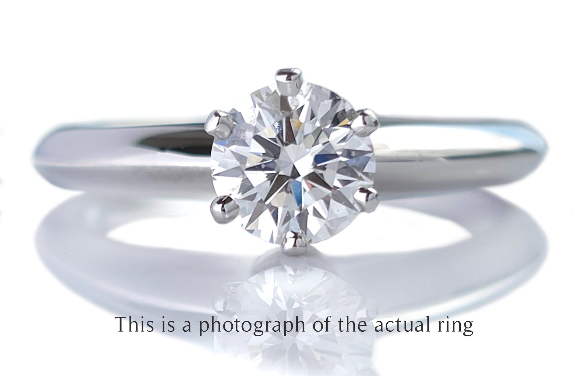 Tiffany & Co 0.69ct F/VS2 Round Brilliant Cut Diamond Engagement Ring