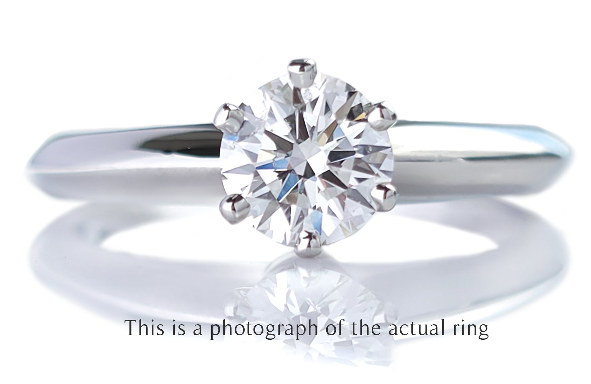 Tiffany & Co 0.69ct F/VS2 Round Brilliant Cut Diamond Engagement Ring