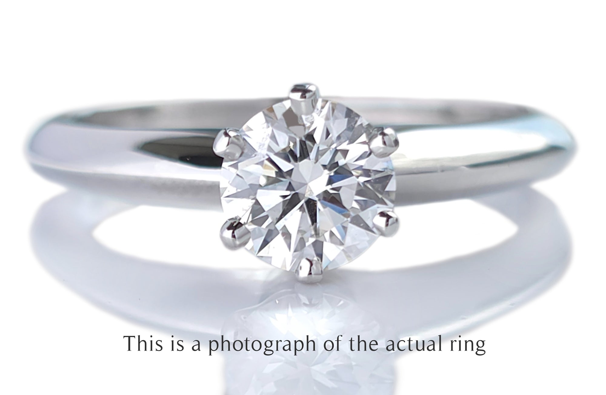 Tiffany & Co 0.69ct F/VS2 Round Brilliant Cut Diamond Engagement Ring