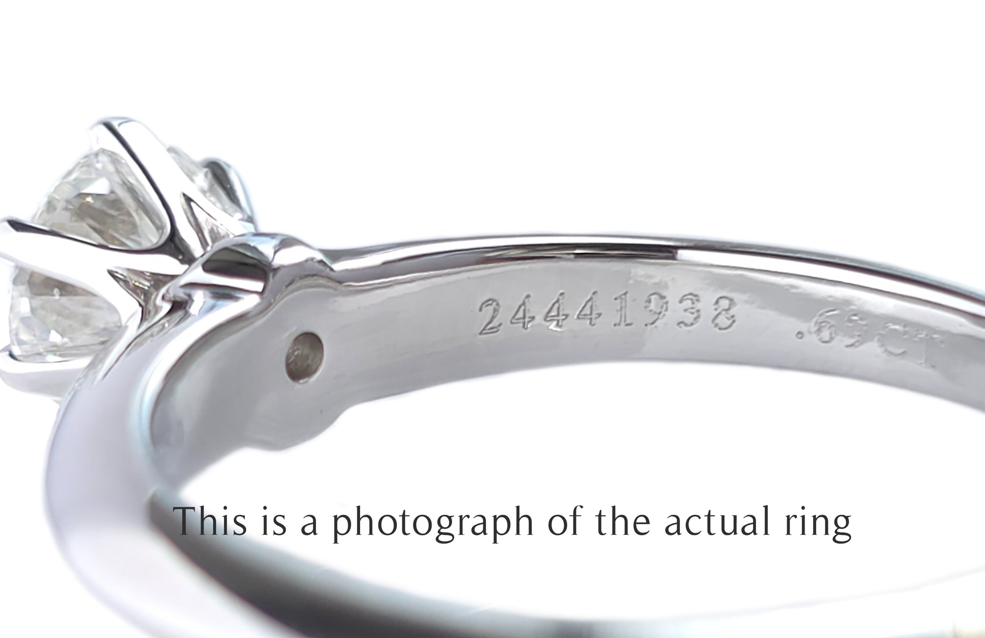 Tiffany & Co 0.69ct F/VS2 Round Brilliant Cut Diamond Engagement Ring