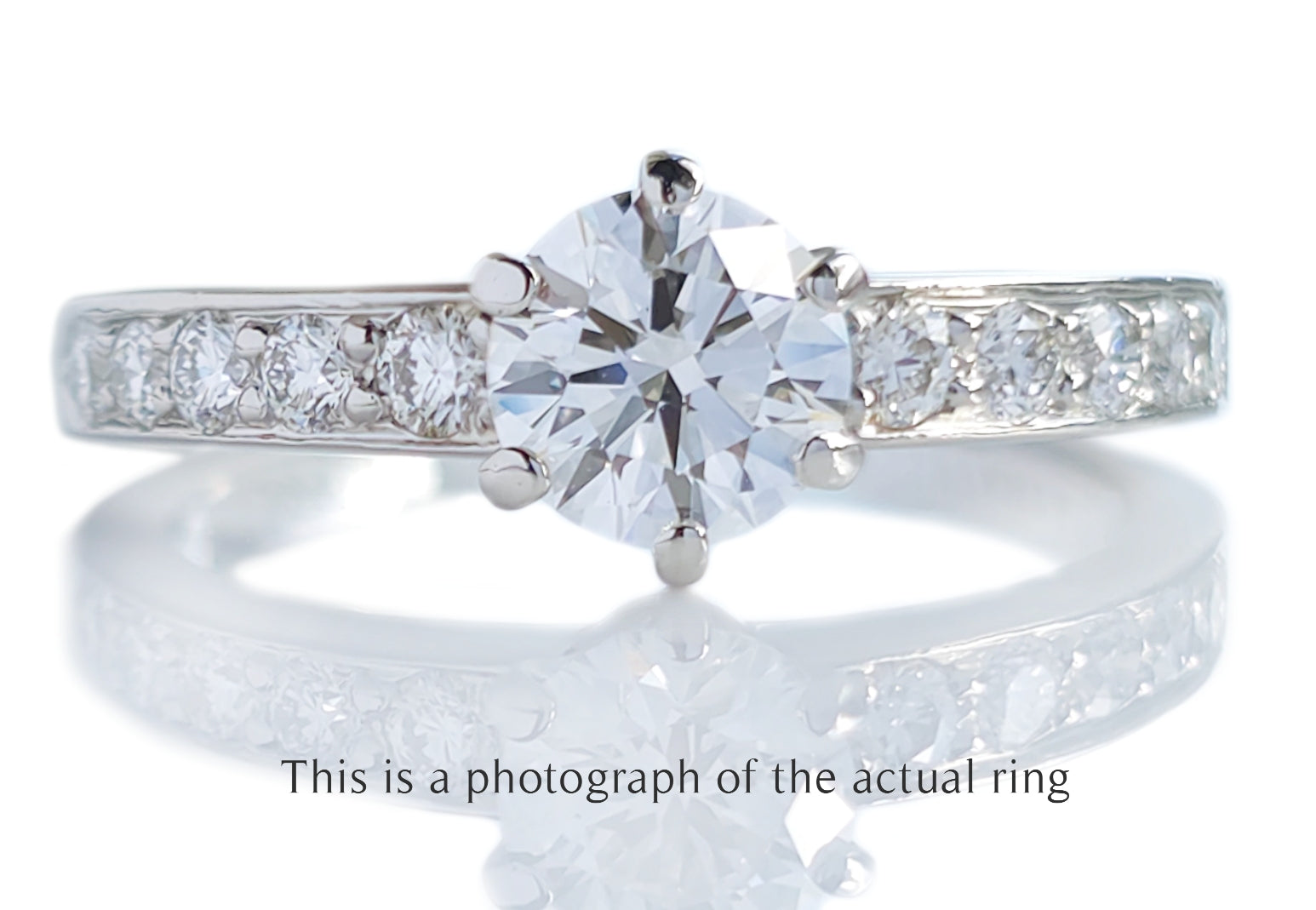 Tiffany & Co 0.86tcw F/VS1 Round Brilliant Diamond Engagement Ring with Side Stones