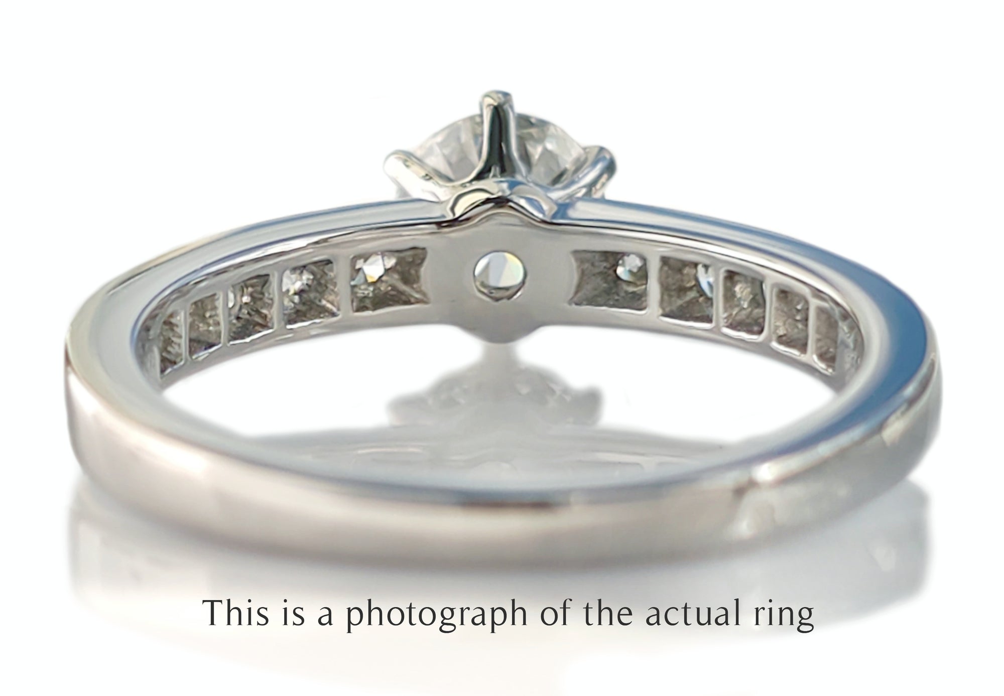 Tiffany & Co 0.86tcw F/VS1 Round Brilliant Diamond Engagement Ring with Side Stones