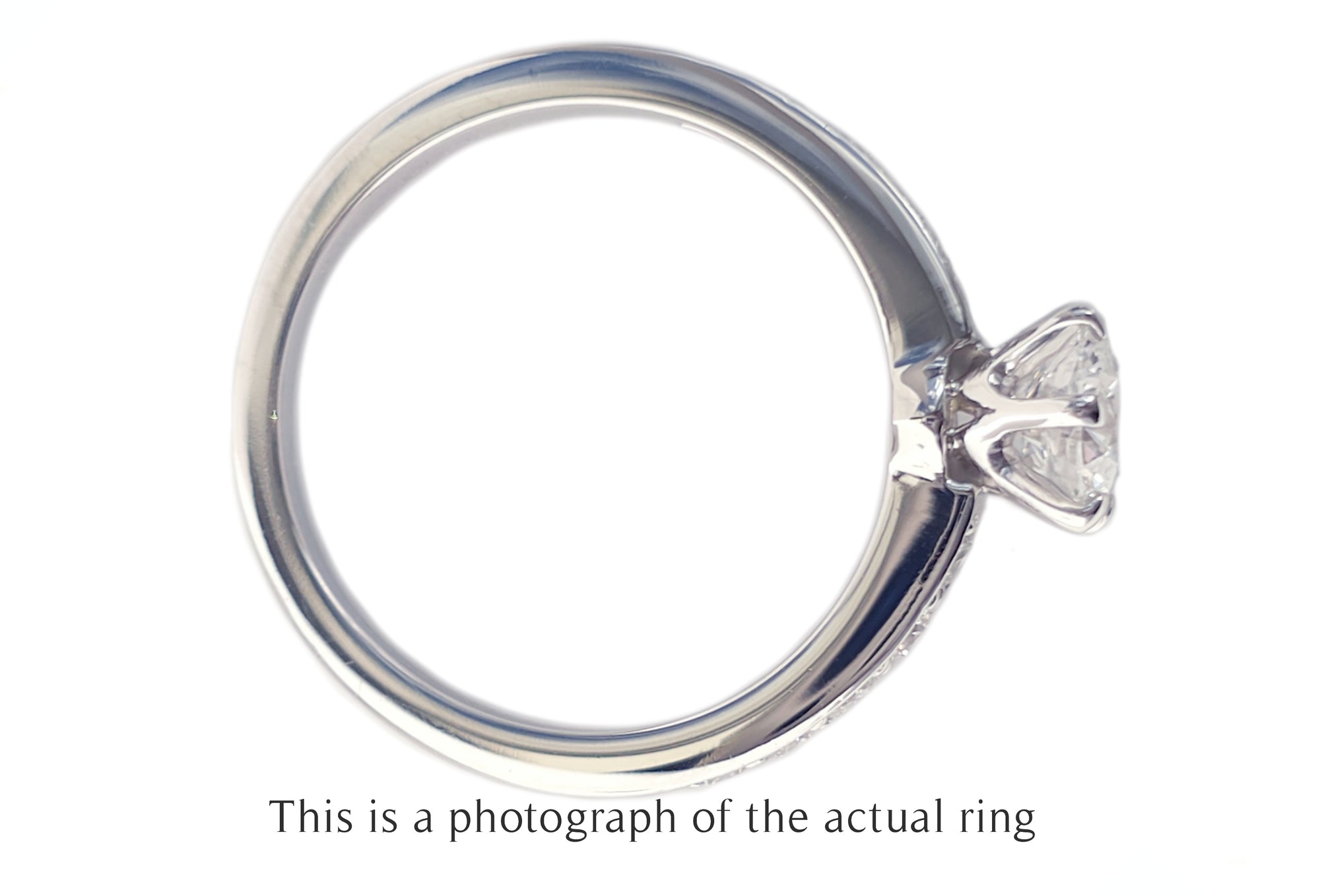 Tiffany & Co 0.86tcw F/VS1 Round Brilliant Diamond Engagement Ring with Side Stones