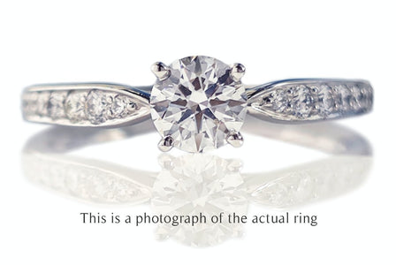 Tiffany & Co. 0.58tcw D/IF Harmony Round Brilliant Cut Diamond Engagement Ring with Side Stones - Bloomsbury Manor Ltd