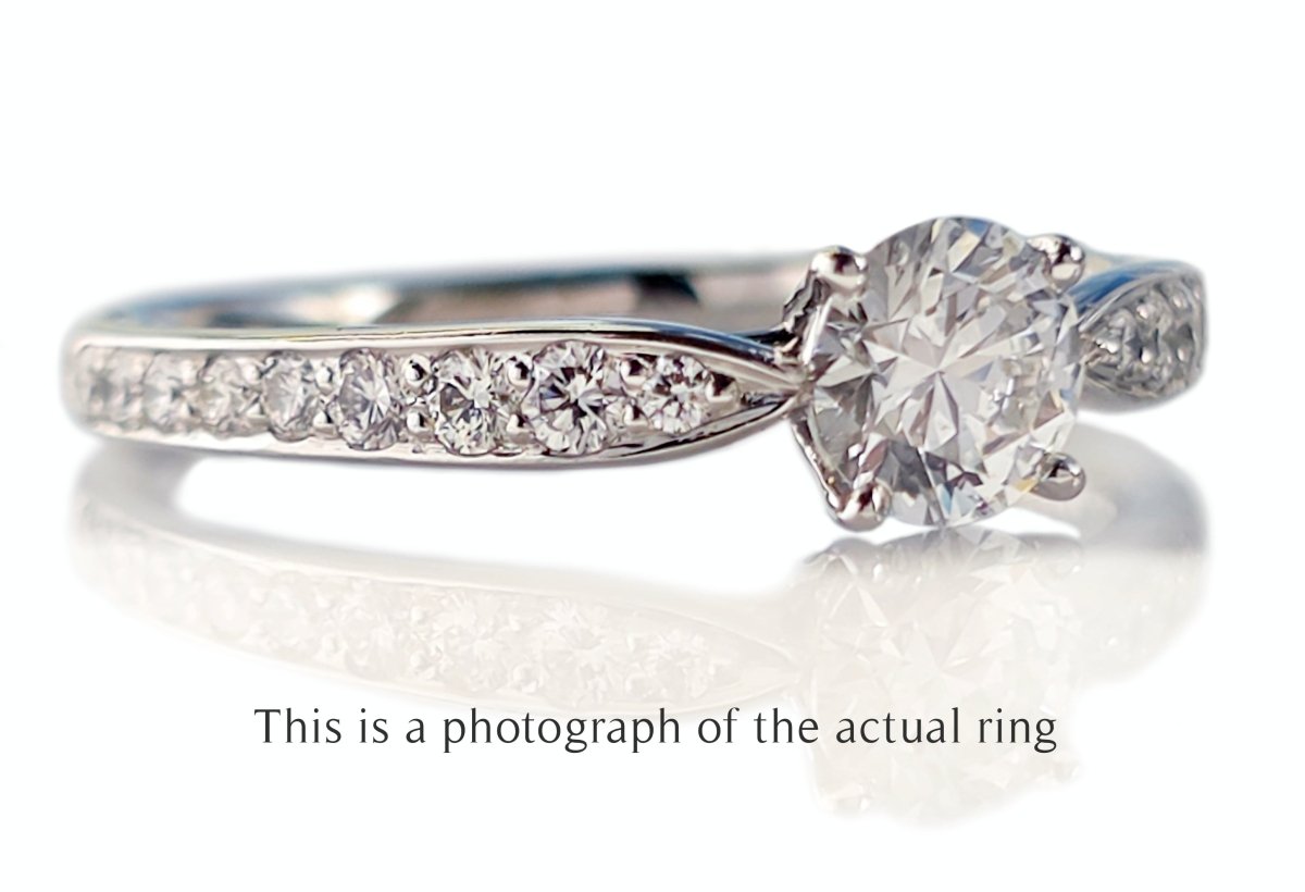 Tiffany & Co. 0.58tcw D/IF Harmony Round Brilliant Cut Diamond Engagement Ring with Side Stones - Bloomsbury Manor Ltd