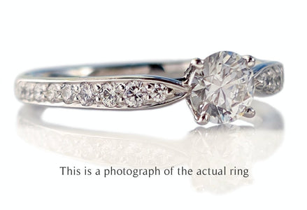 Tiffany & Co. 0.58tcw D/IF Harmony Round Brilliant Cut Diamond Engagement Ring with Side Stones - Bloomsbury Manor Ltd