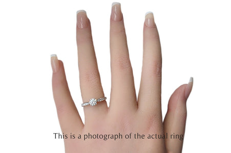 Tiffany & Co. 0.58tcw D/IF Harmony Round Brilliant Cut Diamond Engagement Ring with Side Stones - Bloomsbury Manor Ltd