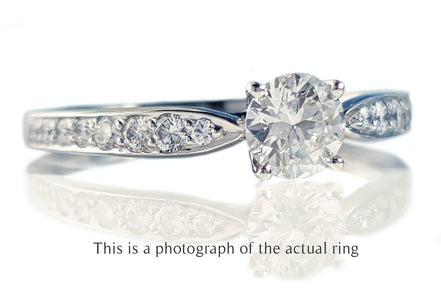 Tiffany & Co. 0.58tcw D/IF Harmony Round Brilliant Cut Diamond Engagement Ring with Side Stones - Bloomsbury Manor Ltd
