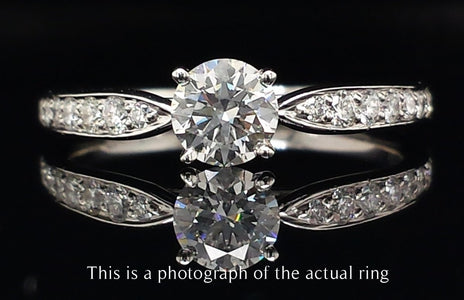 Tiffany & Co. 0.58tcw D/IF Harmony Round Brilliant Cut Diamond Engagement Ring with Side Stones - Bloomsbury Manor Ltd
