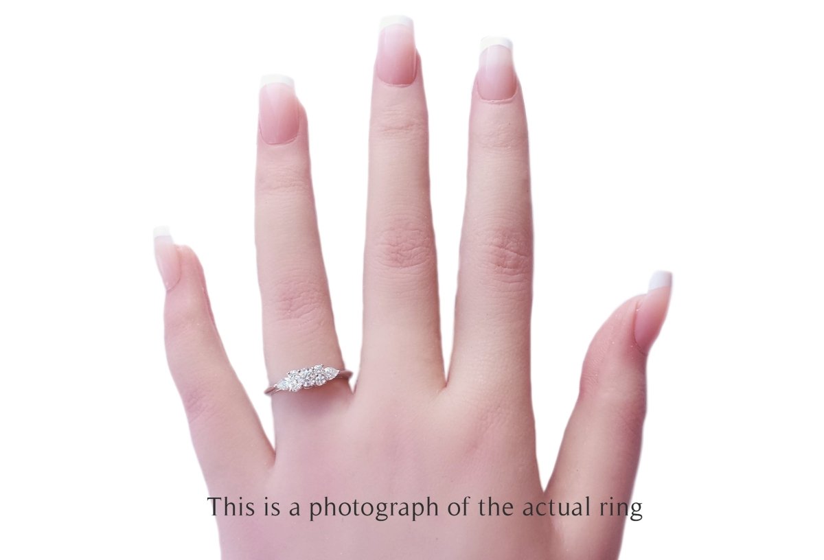 Tiffany & Co. 0.63ct 7 - Stone Diamond Engagement Ring - Bloomsbury Manor Ltd