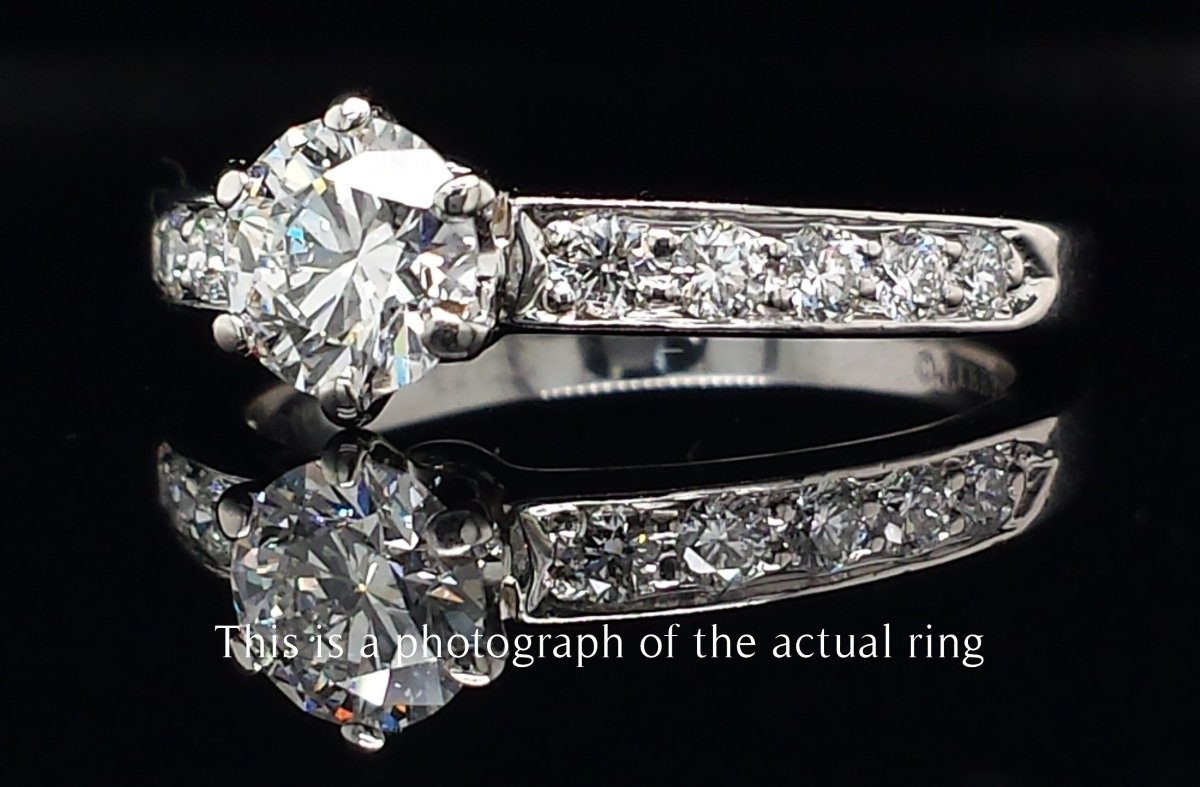 Tiffany & Co. 0.86tcw F/VS1 Round Brilliant Diamond Engagement Ring with Side Stones - Bloomsbury Manor Ltd