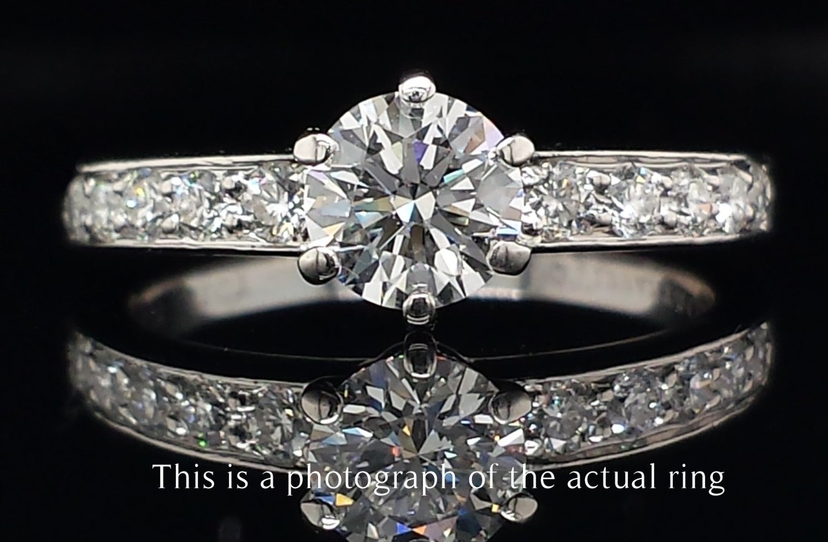 Tiffany & Co. 0.86tcw F/VS1 Round Brilliant Diamond Engagement Ring with Side Stones - Bloomsbury Manor Ltd