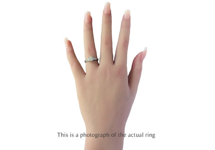 Tiffany & Co 1.63tcw F/VVS2 Round Brilliant Diamond Engagement Ring with Princess Cut Side Stones - Bloomsbury Manor Ltd