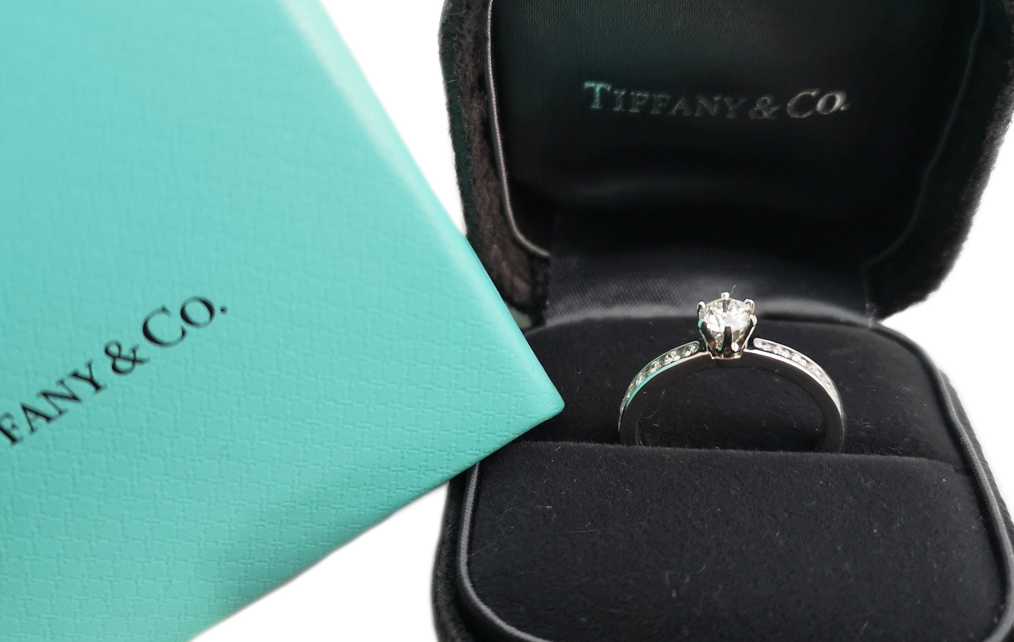 Tiffany & Co. 0.53tcw G/VS Round Brilliant Diamond Engagement Ring with Side Stones