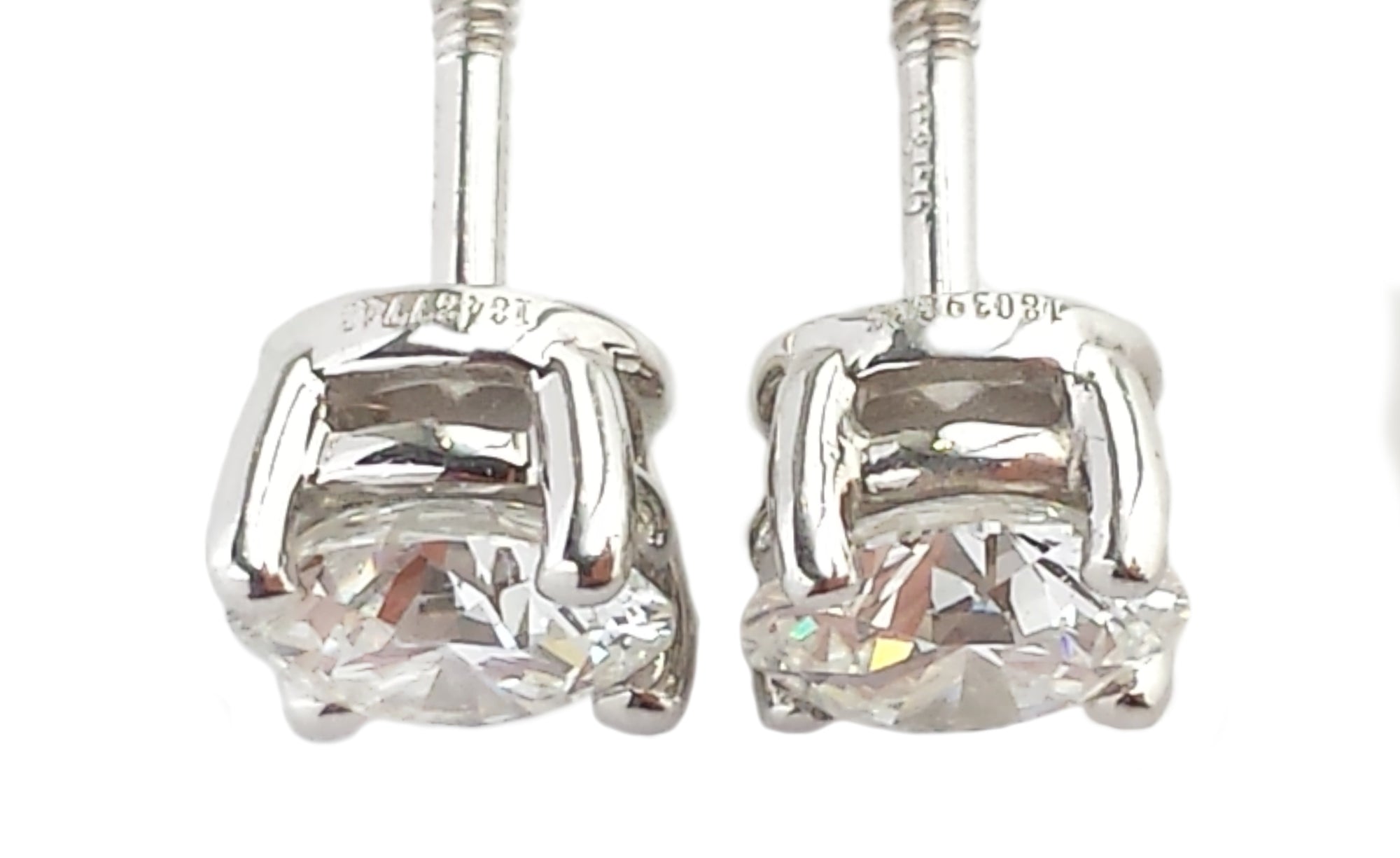 Tiffany & Co .80tcw H/VS1 Round Brilliant Cut Diamond Stud Earrings