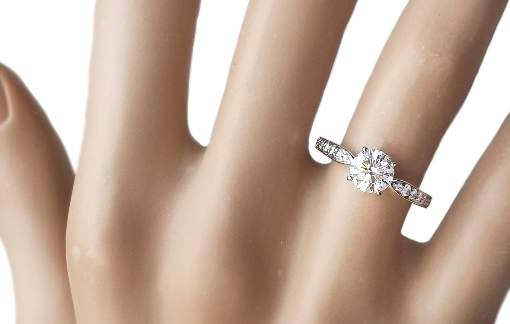 Tiffany & Co. 1.01tcw G/VS1 Triple XXX Harmony Diamond Engagement Ring on finger