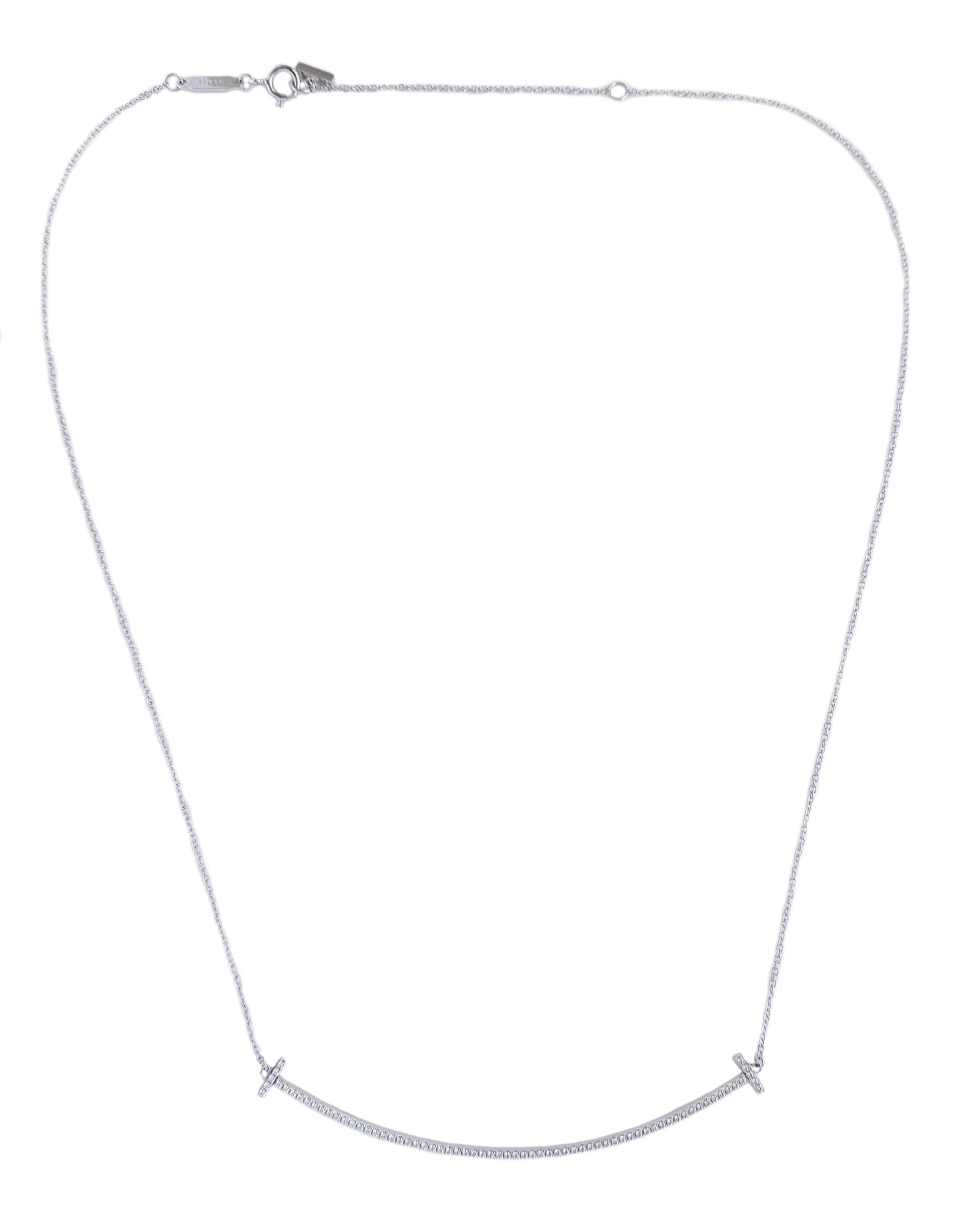 Tiffany T medium smile pendant in 18k white gold with diamonds. | Tiffany &  Co.