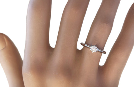 Tiffany & Co. 0.24ct I/VS2 Round Brilliant Diamond Engagement Ring on finger