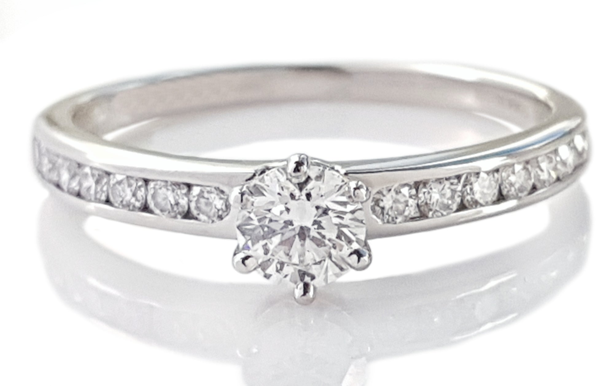 Tiffany & Co. 0.58tcw H/VVS2 Round Brilliant Cut Diamond Engagement Ring with Side Stones