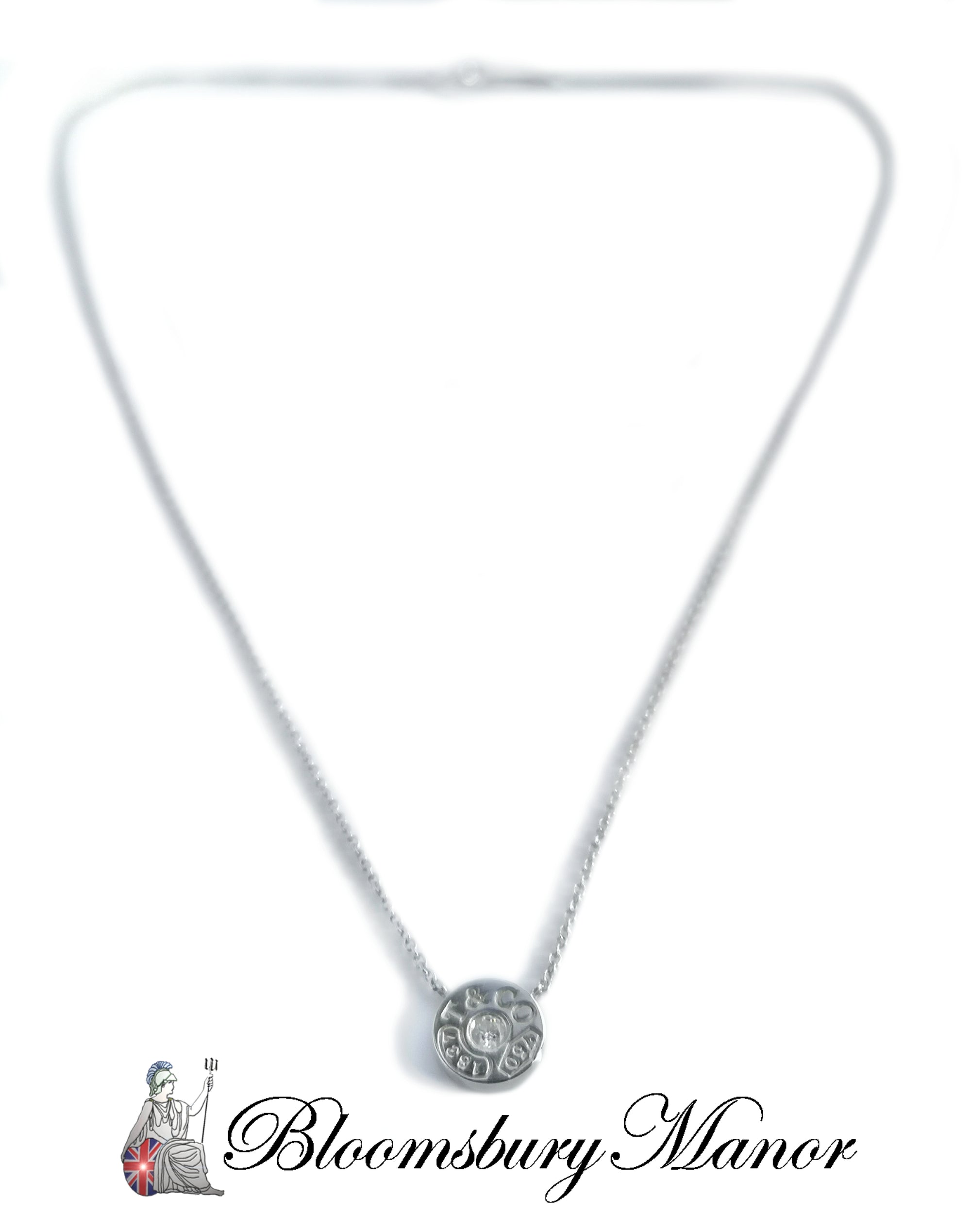Tiffany T circle pendant in 18k rose gold. | Tiffany & Co.