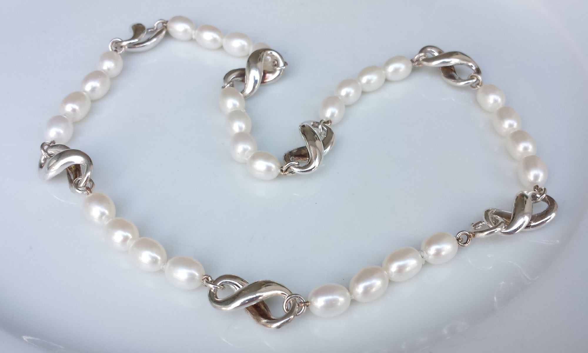 Tiffany & Co. Freshwater Pearl & Sterling Silver 16 inch Infinity (8) Necklace