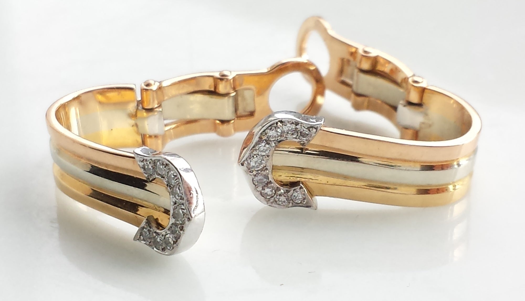 Cartier Double C 'de Cartier' Clip-on Earrings in 18K Trinity Gold & Diamond Setting