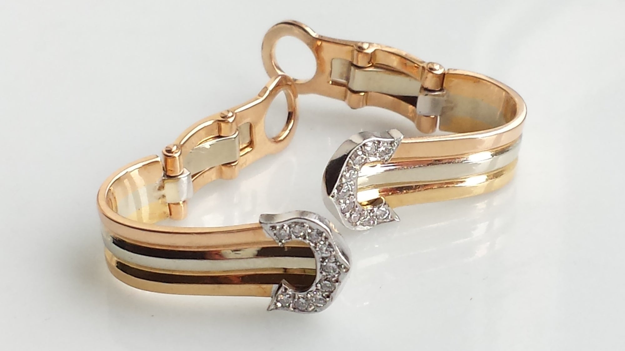 Cartier Double C 'de Cartier' Clip-on Earrings in 18K Trinity Gold & Diamond Setting
