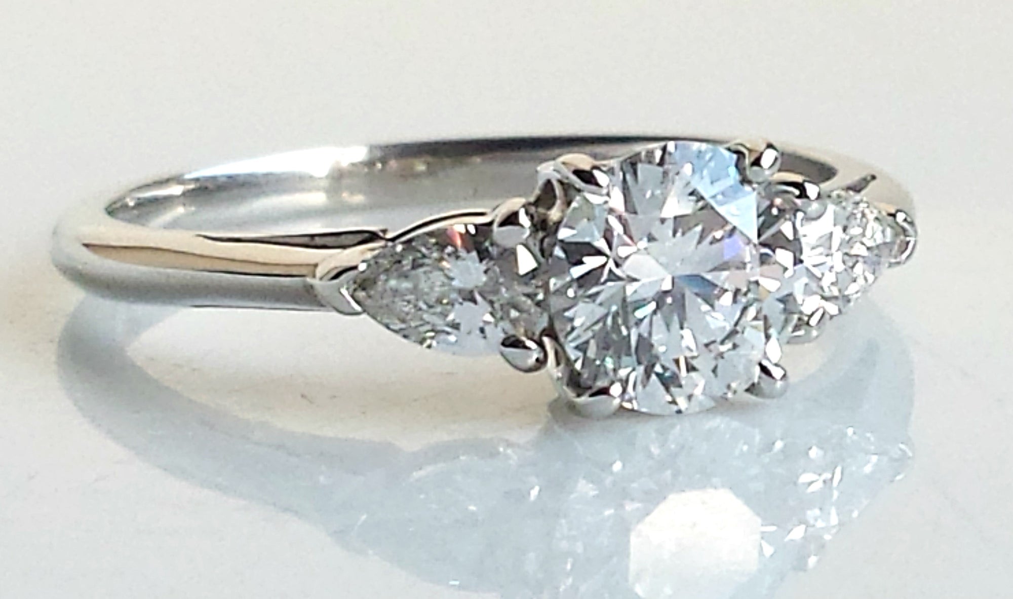 Tiffany & Co. 1.24ct G/VS1 Round Brilliant Cut Diamond Engagement Ring with Pear-shaped Side Stones