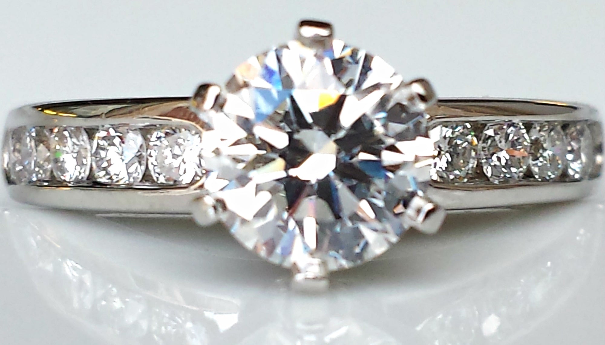 Tiffany & Co. 1.25ct G/IF Round Brilliant Cut Diamond Engagement Ring with Channel Set Band