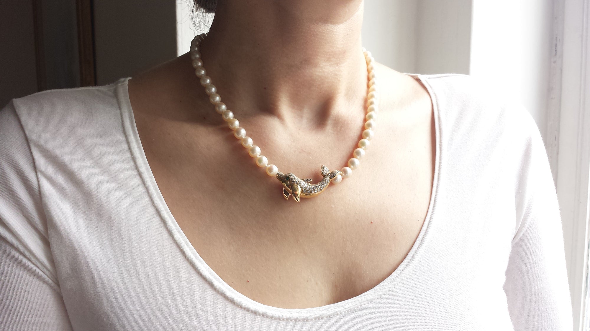 Cartier Akoya Pearl Dolphin Necklace in 18K Gold set with Diamonds & Emerald