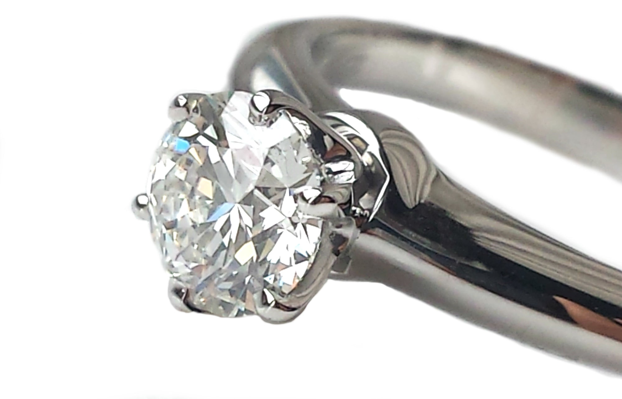 Tiffany & Co. 0.63ct H/VS2 Round Brilliant Cut Diamond Engagement Ring
