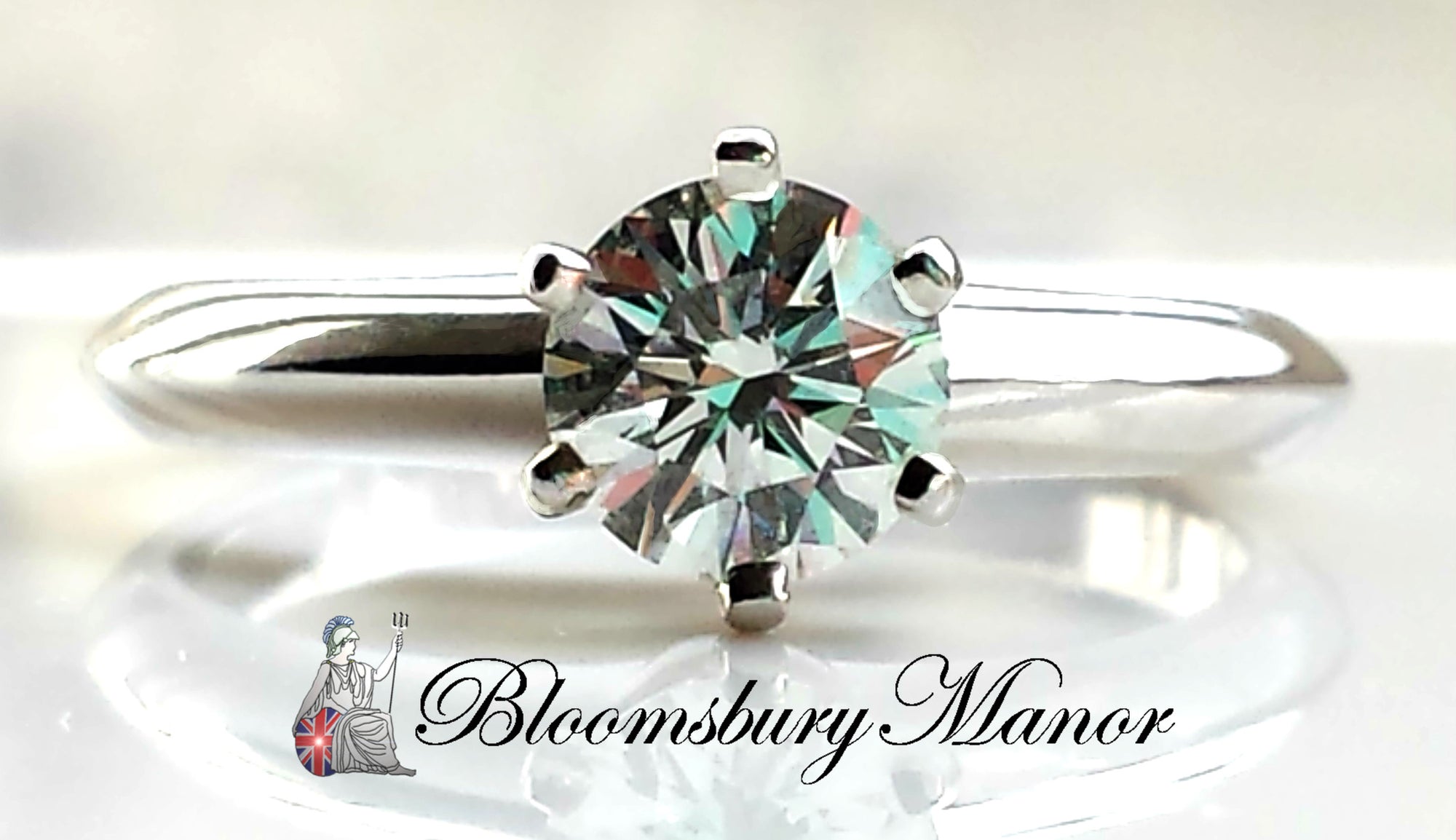 Tiffany & Co .58ct G/VVS1 Tiffany Round Brilliant Platinum Engagement Ring